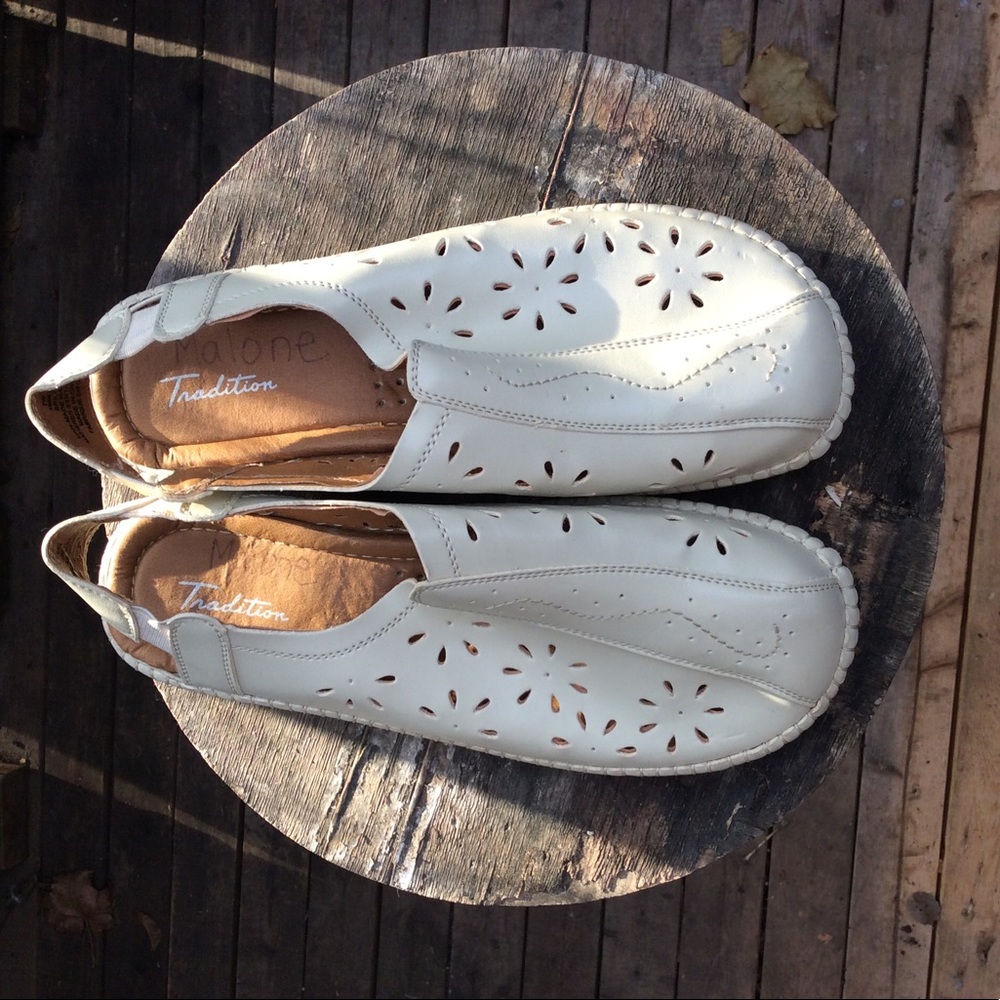 Cream perforated flower design sling back flats